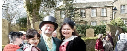 A 'Victorian family' posing outside the Brontë Parsonage